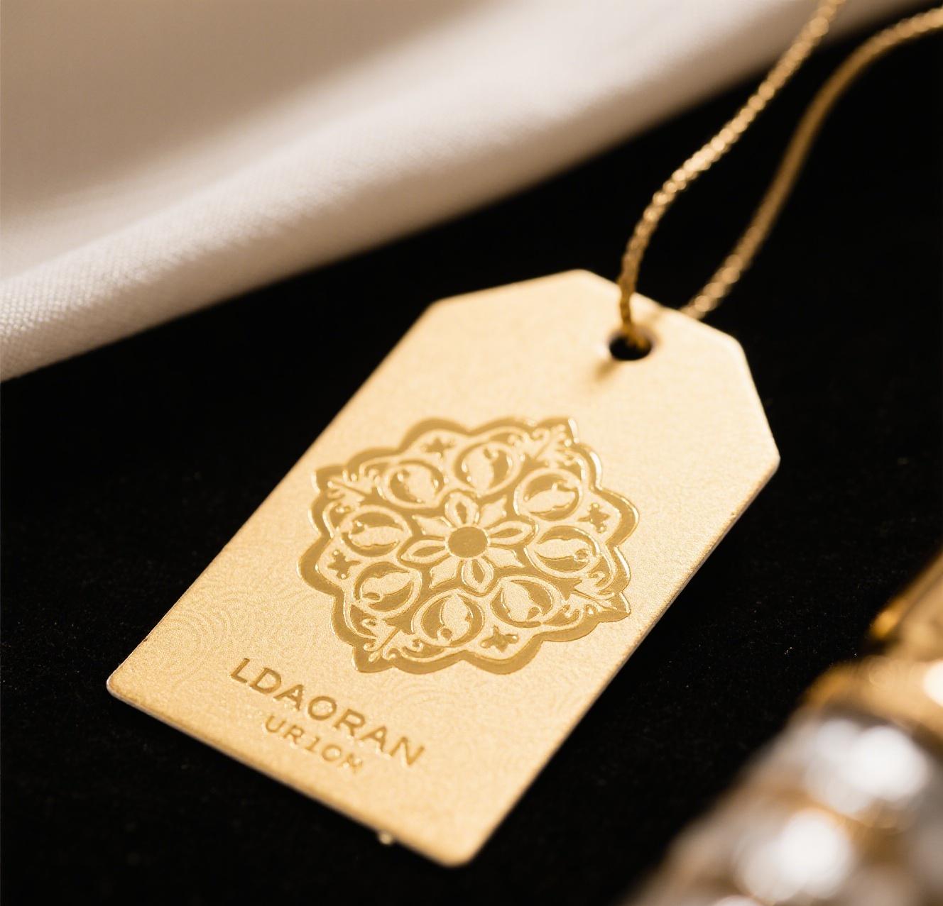 Elegant gold foil hang tags with intricate designs for luxury products
